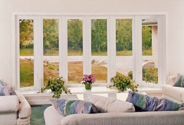 Energy-efficient replacement window installation in Milwaukee, WI by Empire Home Remodeling, enhancing home comfort and aesthetics