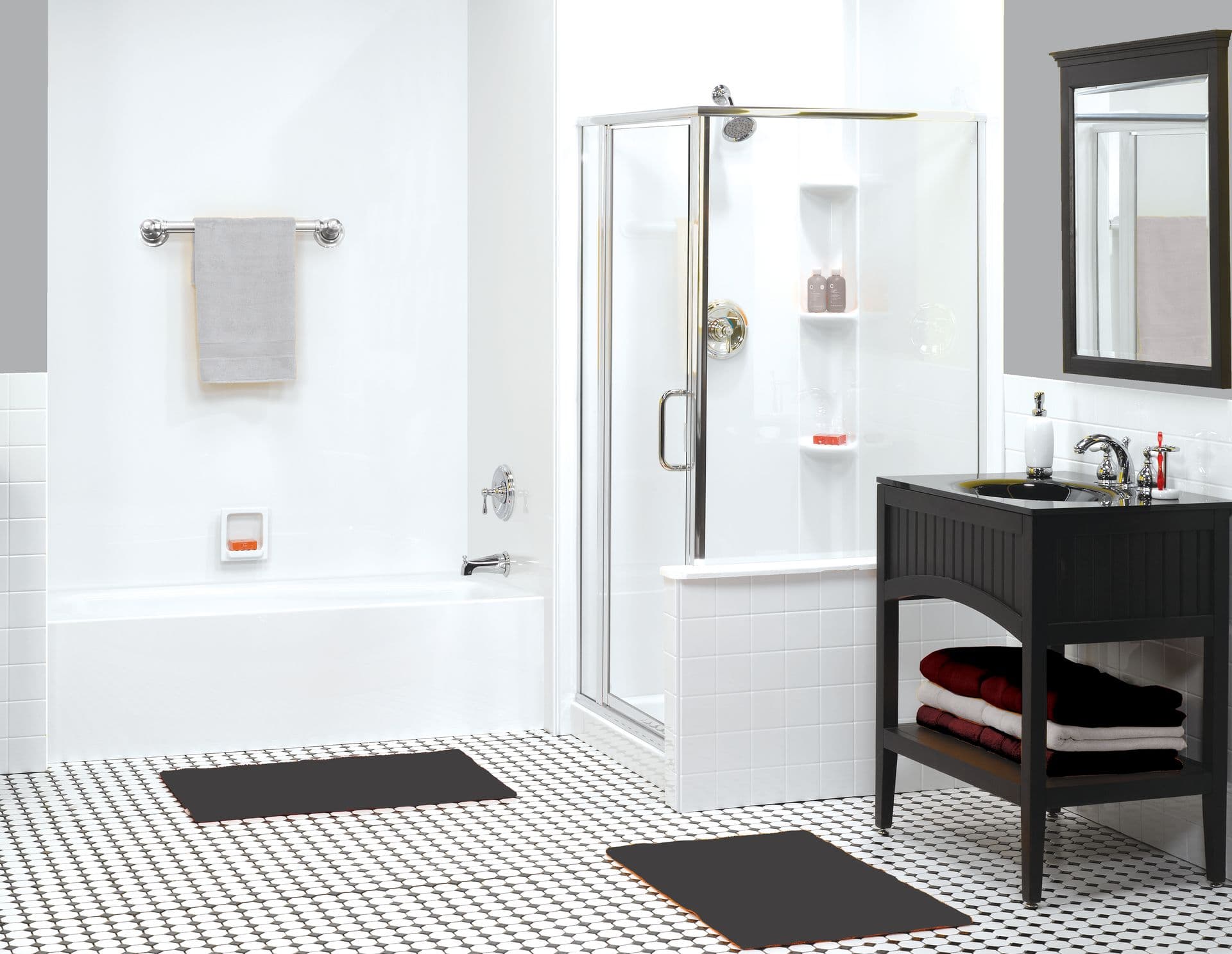 Renovated bathroom in Waukesha, WI featuring new bathtub and barrier-free shower