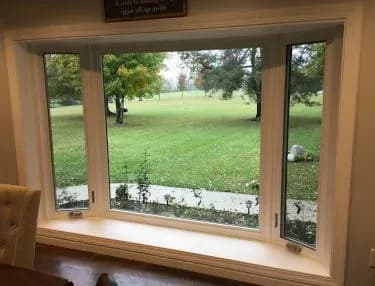 Bay windows installed in Milwaukee, WI home by Empire Home Remodeling for style and energy efficiency