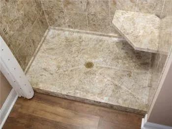 Tub-to-shower conversion with modern walk-in shower installed in Milwaukee, WI home by Empire Home Remodeling