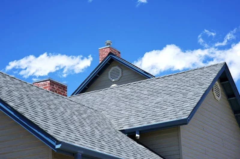 Roof repair and full roof replacement comparison in Milwaukee, WI home by Empire Home Remodeling, ensuring durability and weather protection