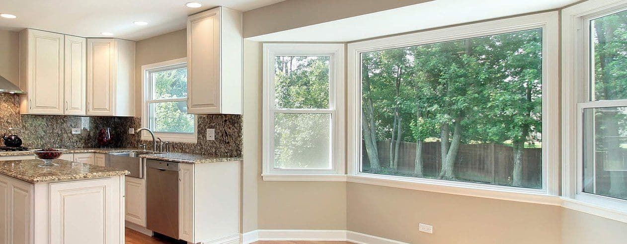 Picture window replacement in Milwaukee, WI home by Empire Home Remodeling showcasing wide outdoor views and enhanced natural lighting